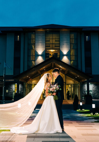 Wedding Couple Front of Hotel Hi Res 1 6